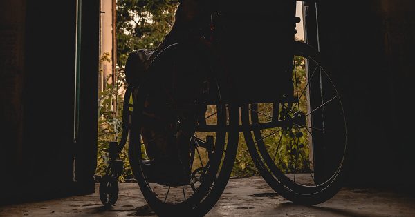 Wheelchair Silhouette in Doorwar